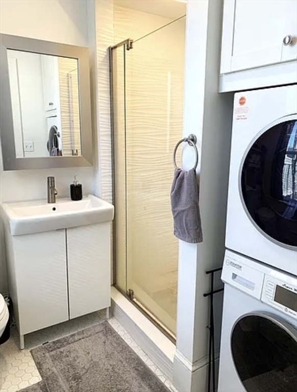167 I Street, Unit 2 Boston, MA 02127 - Photo 9 of 9 a bathroom with a sink and a mirror
