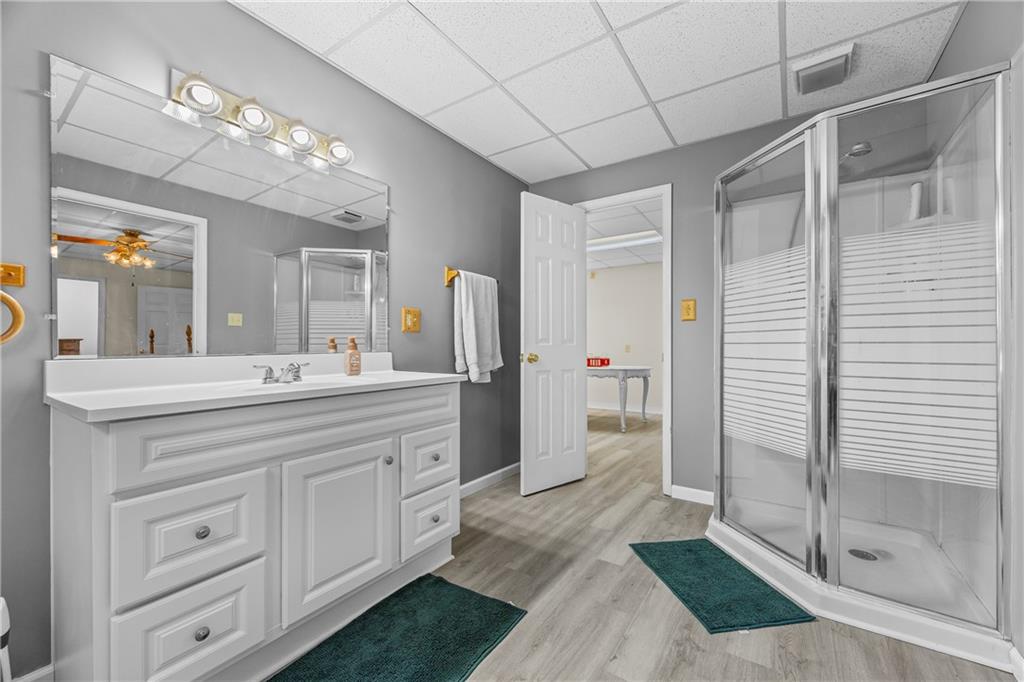 750 Staghorn Trail Nicholson, GA 30565 - Photo 22 of 41 a spacious bathroom with a double vanity sink and a mirror