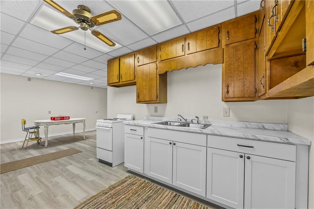 750 Staghorn Trail Nicholson, GA 30565 - Photo 23 of 41 a kitchen with a sink cabinets and appliances