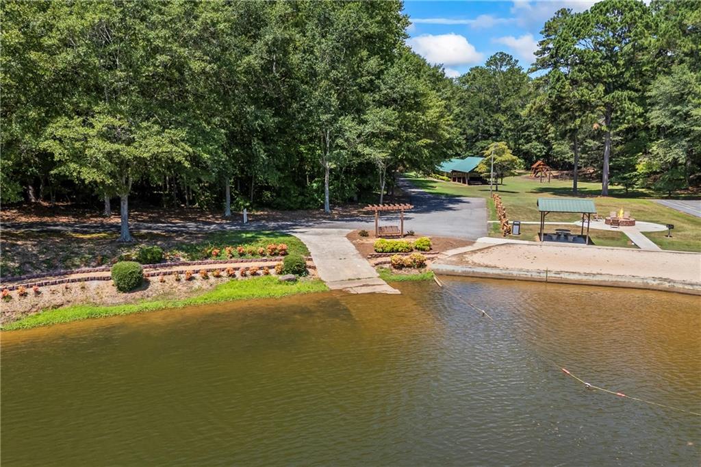 750 Staghorn Trail Nicholson, GA 30565 - Photo 38 of 41 a view of a swimming pool with a yard