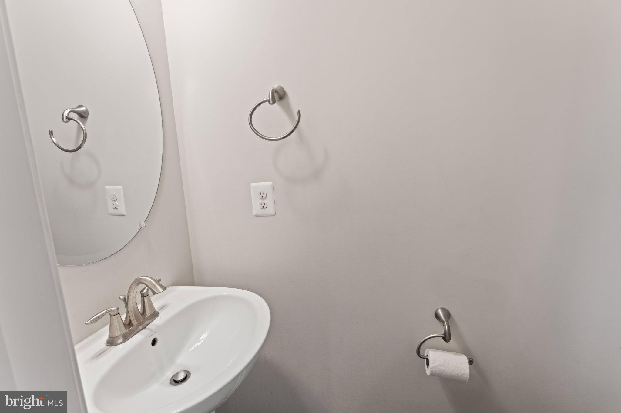 1330 Rail Woodbridge, VA 22191 - Photo 13 of 28 a bathroom with a sink and mirror