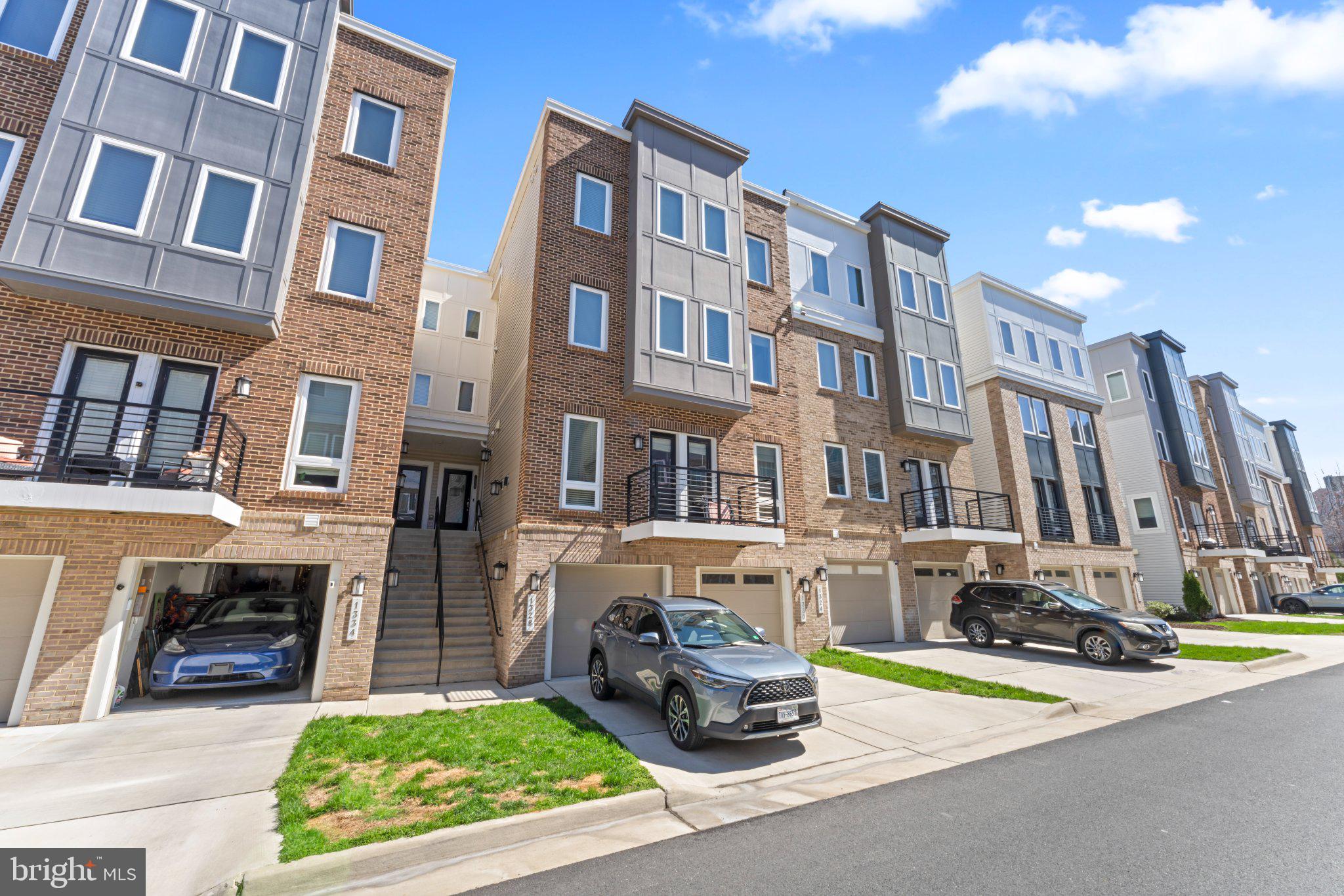 1330 Rail Woodbridge, VA 22191 - Photo 2 of 28 a car parked in front of a brick building