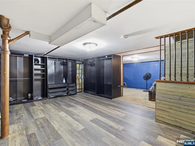 a view of a hallway with closet