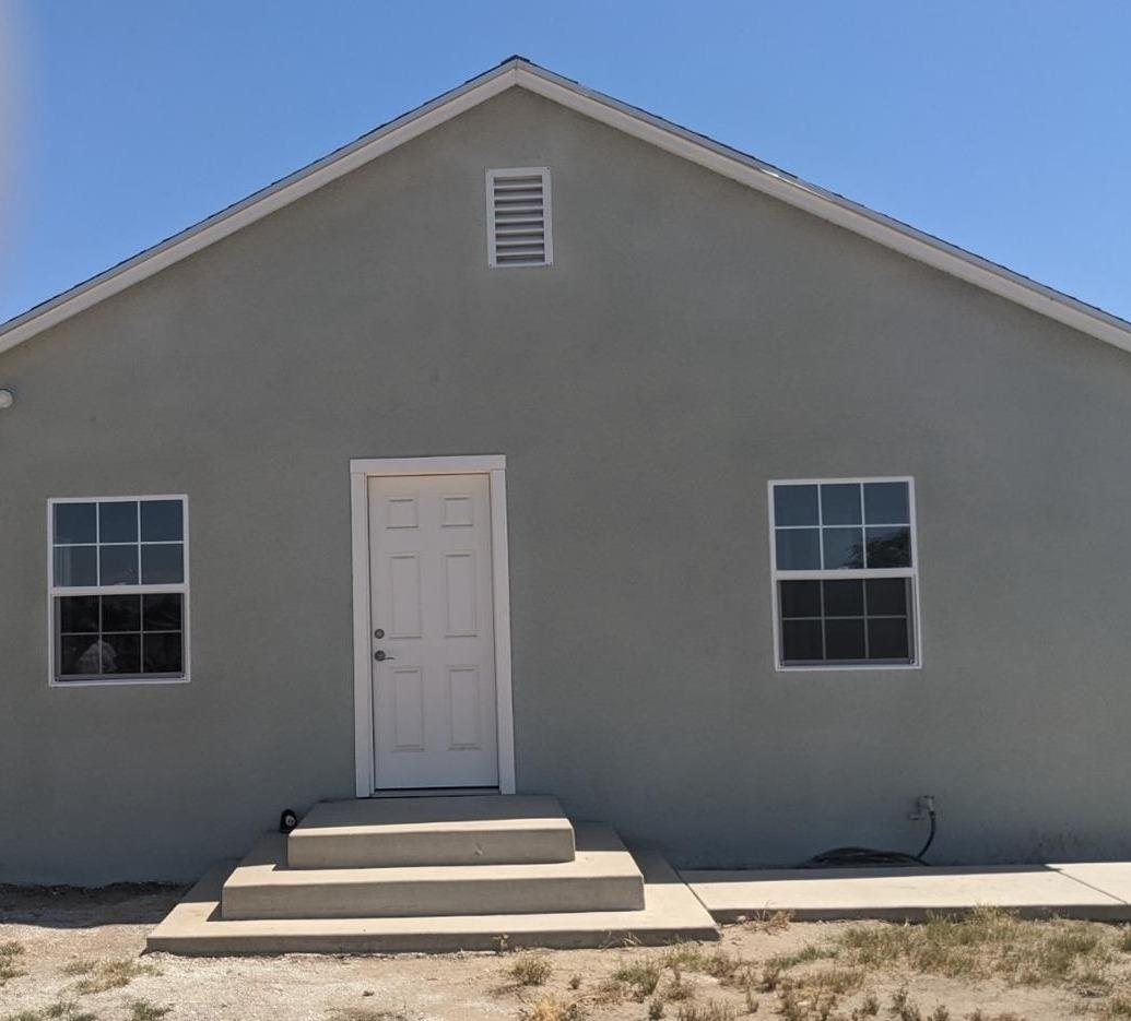 26492 Harrison Road Visalia, CA 93277 - Photo 1 of 29 a view of wooden floor in front of a window