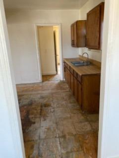26492 Harrison Road Visalia, CA 93277 - Photo 20 of 29 a bathroom with a sink and a mirror