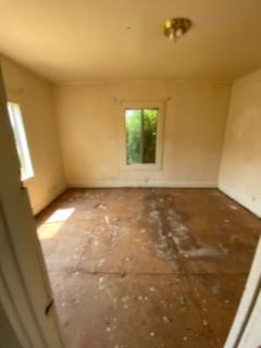 26492 Harrison Road Visalia, CA 93277 - Photo 22 of 29 a view of empty room with wooden floor and fan