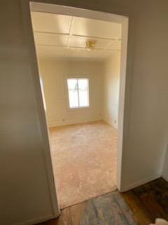 26492 Harrison Road Visalia, CA 93277 - Photo 28 of 29 a view of a small space with wooden floor and a window