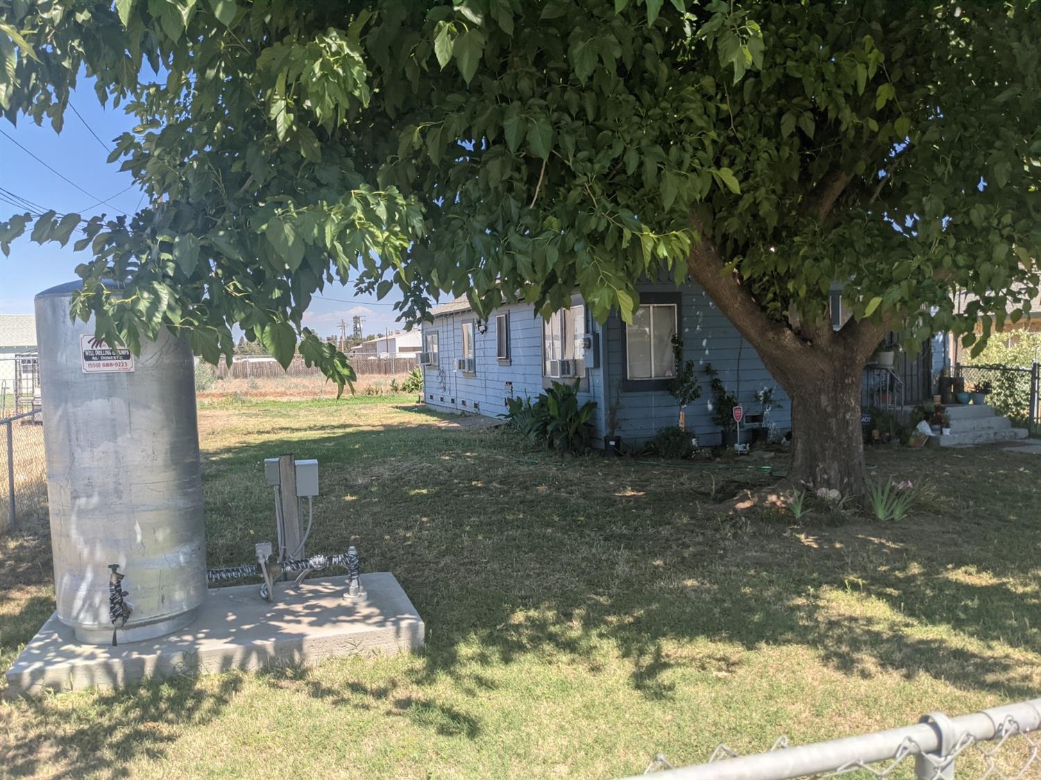 26492 Harrison Road Visalia, CA 93277 - Photo 6 of 29 a view of a yard in front of house