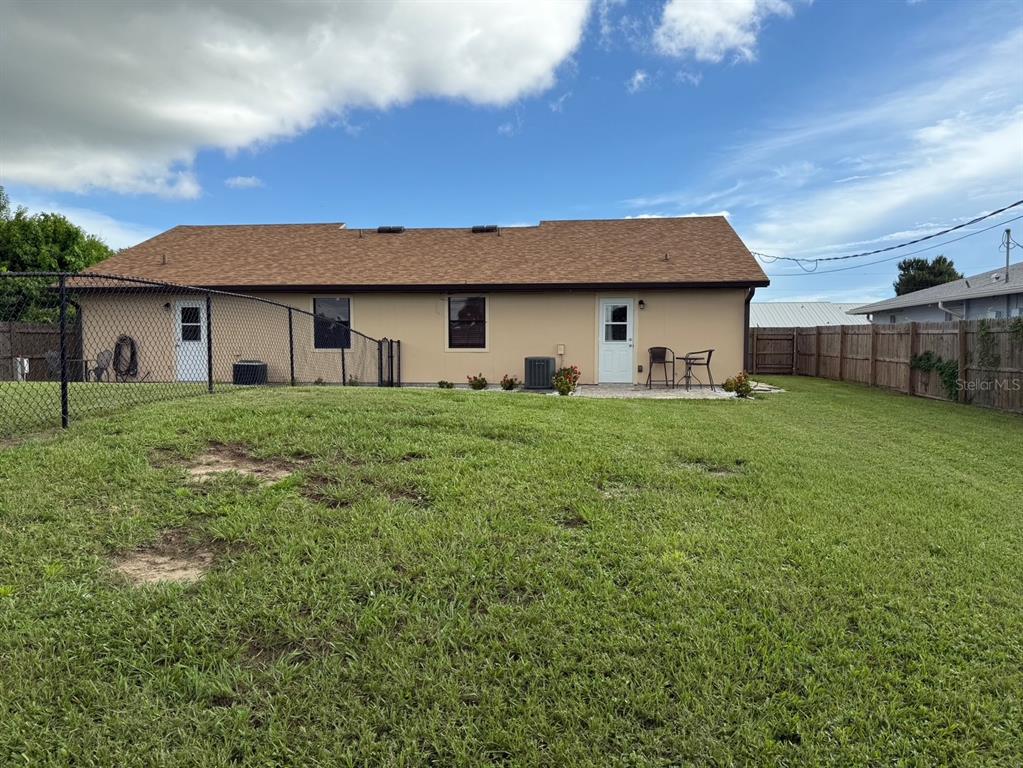 11248 Pendleton Avenue, Unit A&B Englewood, FL 34224 - Photo 14 of 15 a house view with a garden space