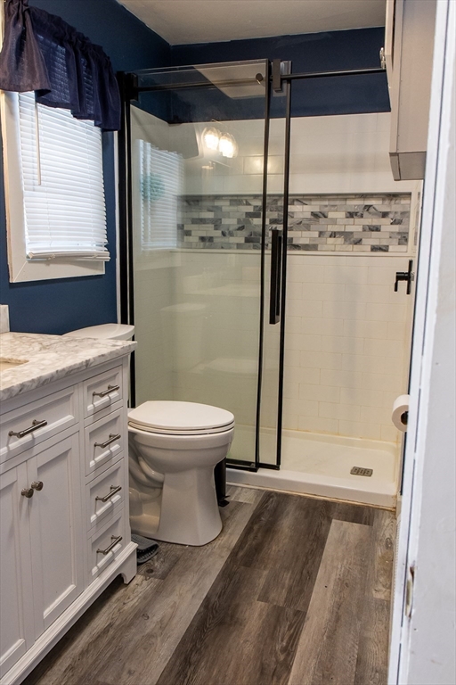 20 Paige Hill Road Brimfield, MA 01010 - Photo 20 of 40 a bathroom with a granite countertop sink toilet and shower