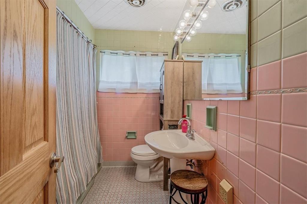 360 Jo Ann Drive Monessen, PA 15062 - Photo 18 of 48 a bathroom with a sink and a toilet