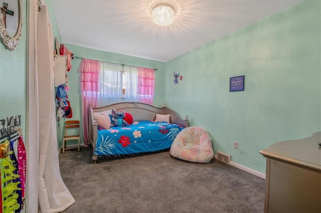 360 Jo Ann Drive Monessen, PA 15062 - Photo 23 of 48 a bedroom with bed and a window