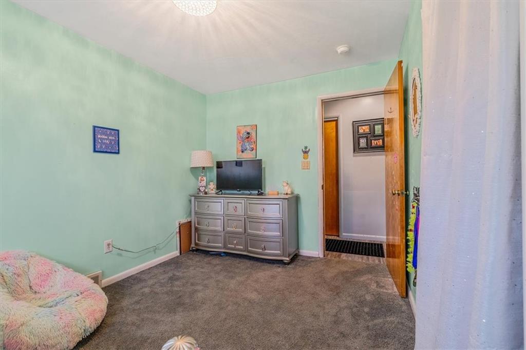 360 Jo Ann Drive Monessen, PA 15062 - Photo 24 of 48 a livingroom with furniture and a flat screen tv