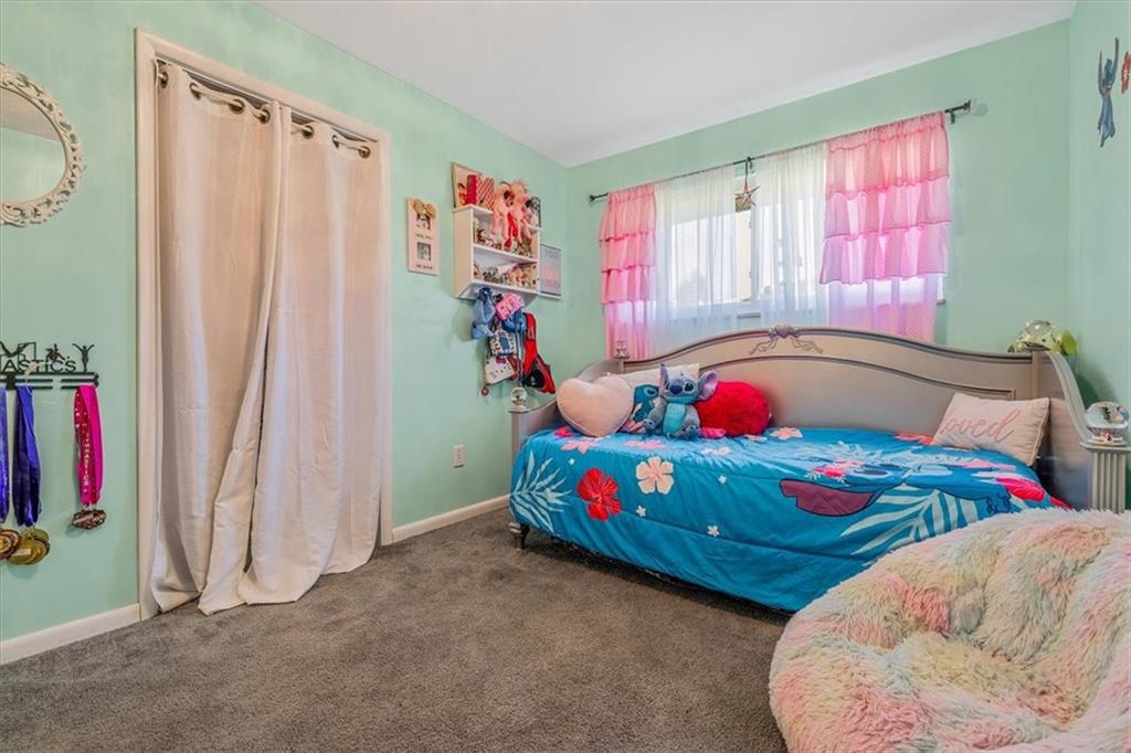 360 Jo Ann Drive Monessen, PA 15062 - Photo 25 of 48 a bedroom with baby bed and a window