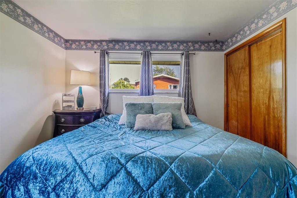 360 Jo Ann Drive Monessen, PA 15062 - Photo 29 of 48 a bedroom with a large bed and a window