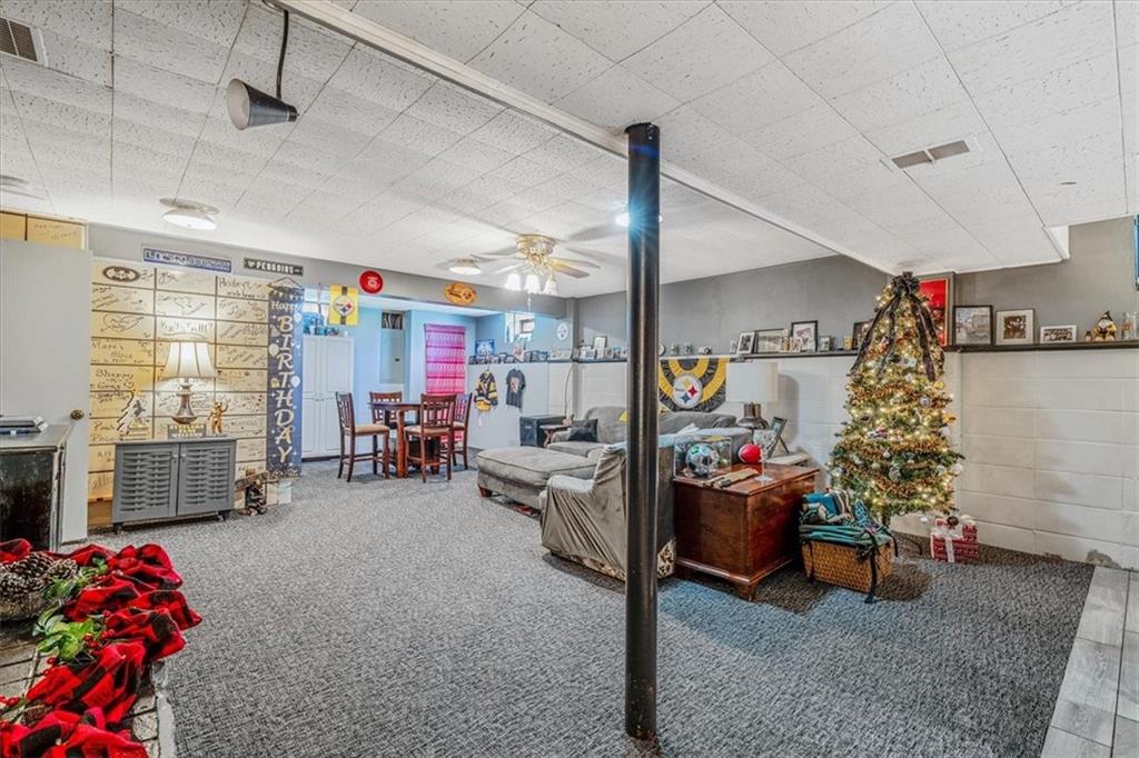 360 Jo Ann Drive Monessen, PA 15062 - Photo 36 of 48 a garage with furniture and a couch