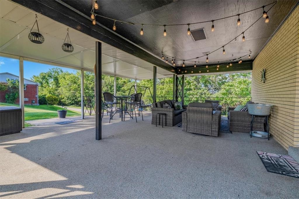 360 Jo Ann Drive Monessen, PA 15062 - Photo 42 of 48 a garage with furniture and a large window