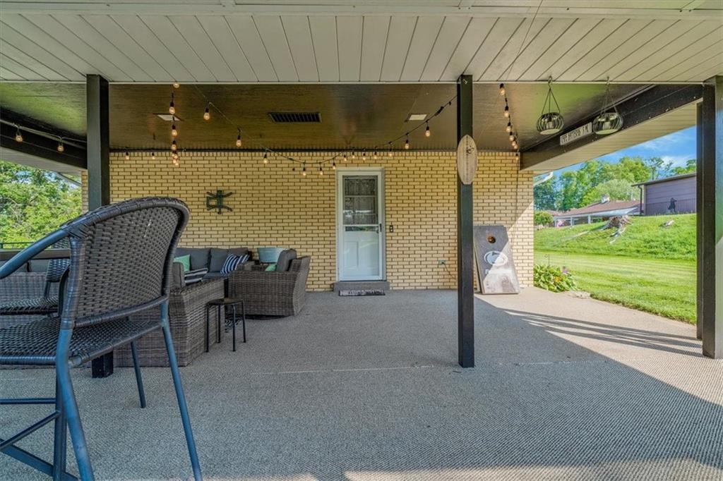 360 Jo Ann Drive Monessen, PA 15062 - Photo 44 of 48 a balcony with furniture and a window