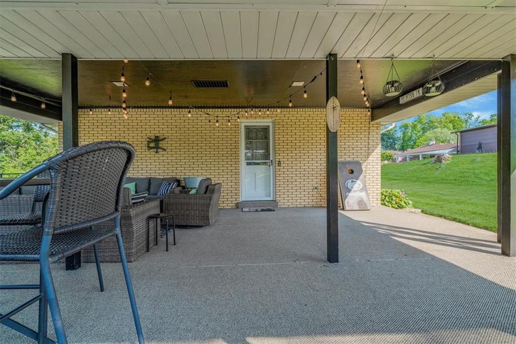 360 Jo Ann Drive Monessen, PA 15062 - Photo 45 of 48 a balcony with furniture and a garden