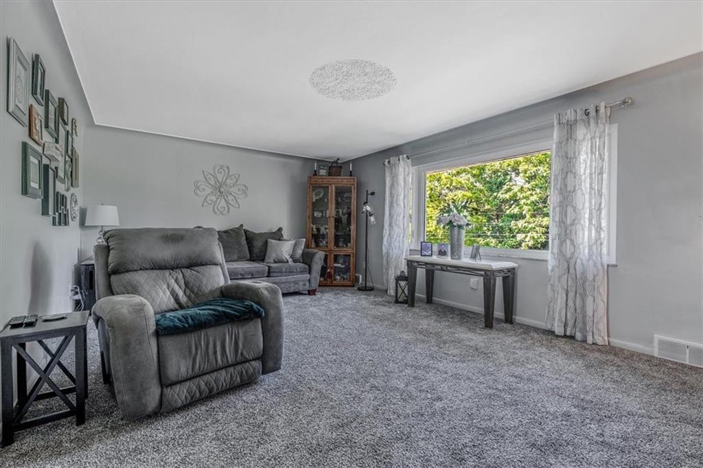 360 Jo Ann Drive Monessen, PA 15062 - Photo 7 of 48 a living room with furniture and a open window