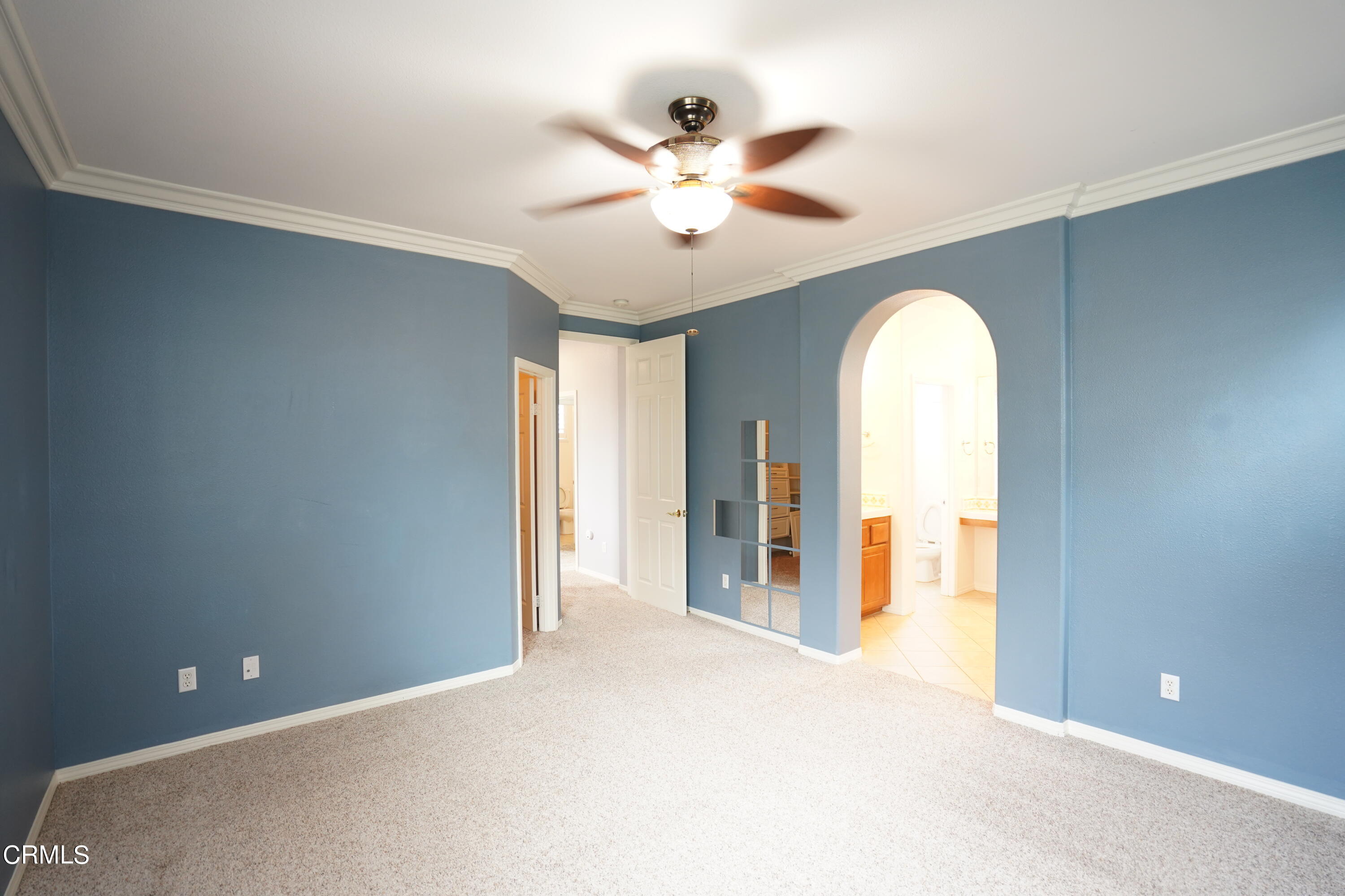 341 Spring Park Road Camarillo, CA 93012 - Photo 11 of 43 wooden floor in white room with windows and ceiling fan