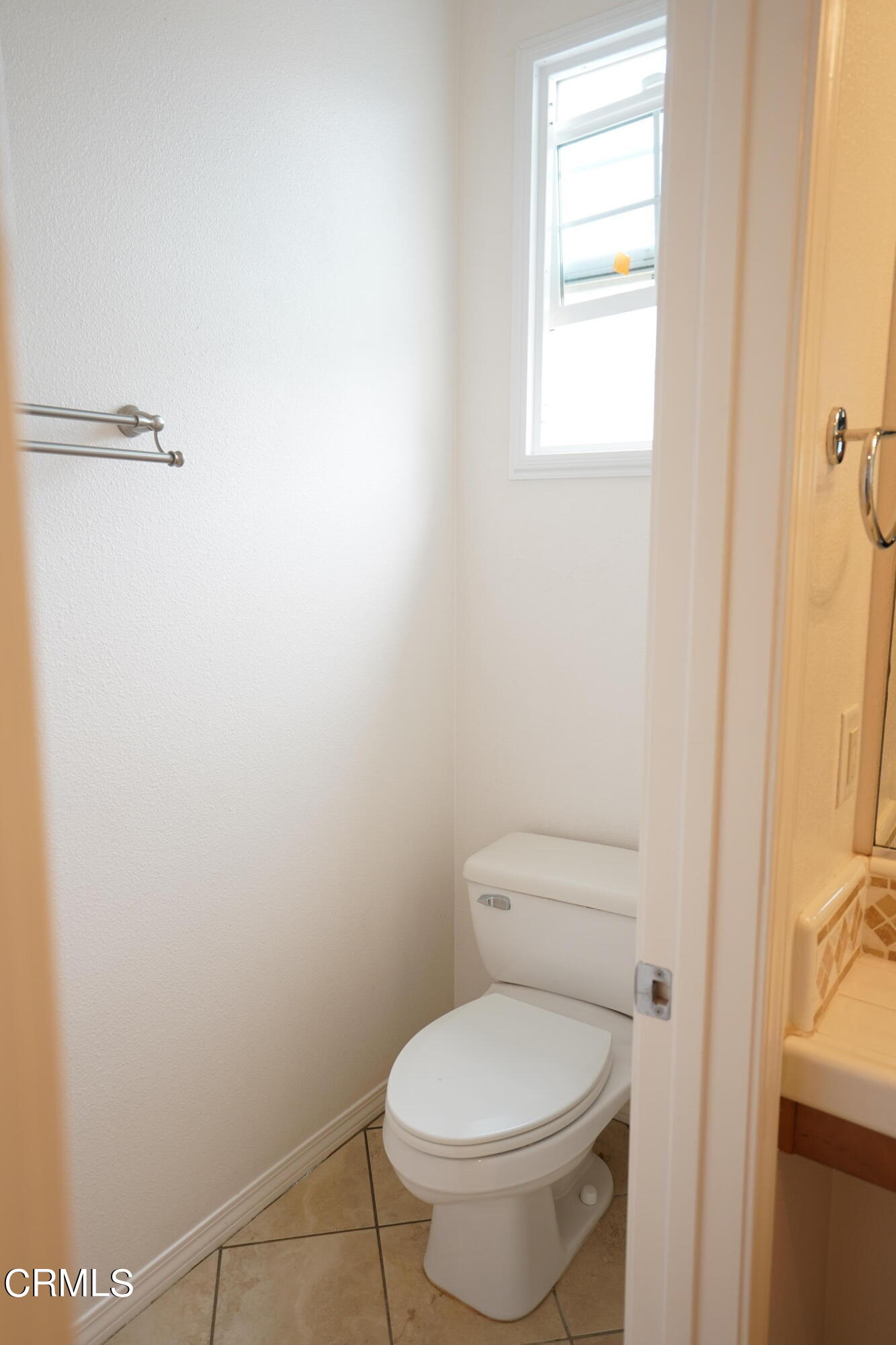 341 Spring Park Road Camarillo, CA 93012 - Photo 18 of 43 a white toilet sitting next to a window