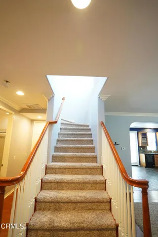 a view of a hallway with staircase