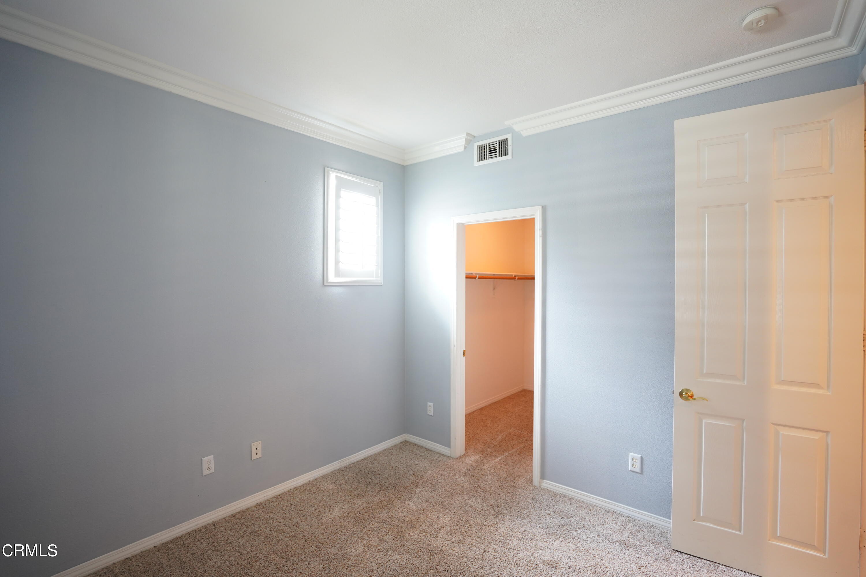 341 Spring Park Road Camarillo, CA 93012 - Photo 30 of 43 a view of an empty room with window and closet area