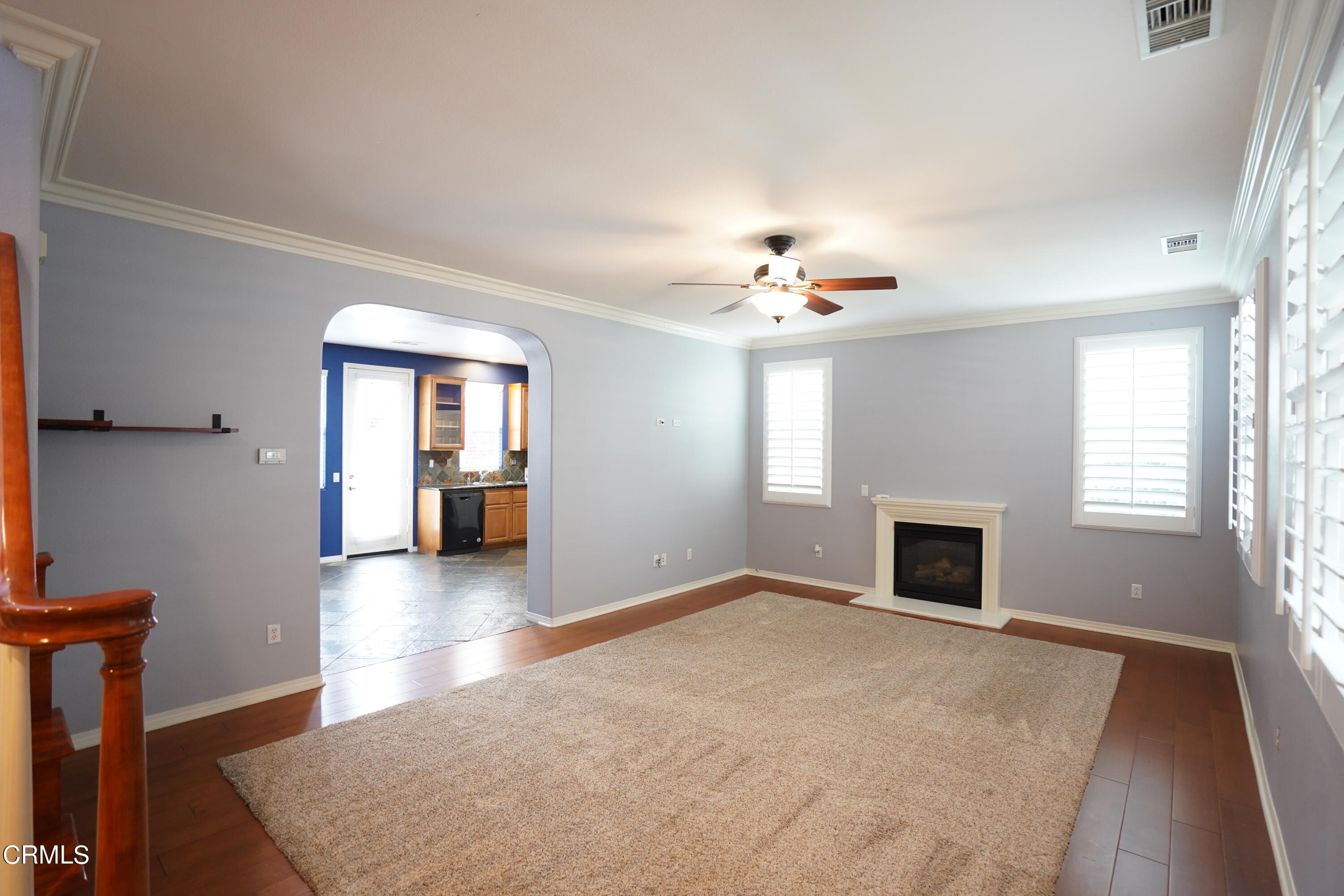 341 Spring Park Road Camarillo, CA 93012 - Photo 5 of 43 a view of an empty room with window and wooden floor