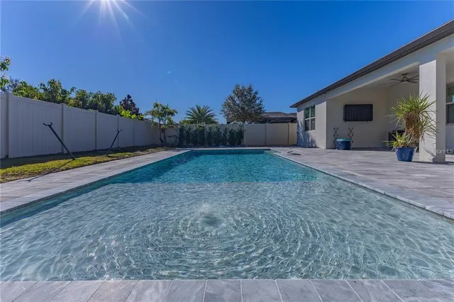 a view of a backyard of the house