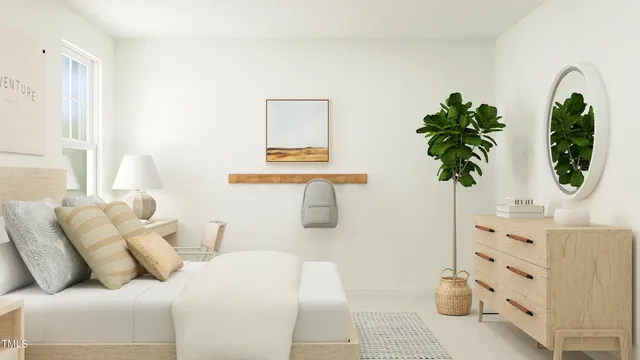 a living room with furniture and potted plant