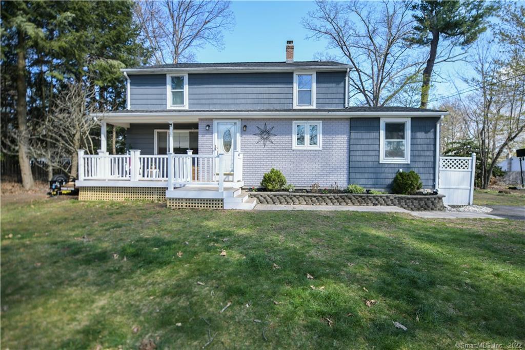 176 Griffin Road Suffield, CT 06093 - Photo 1 of 1 a front view of a house with a yard