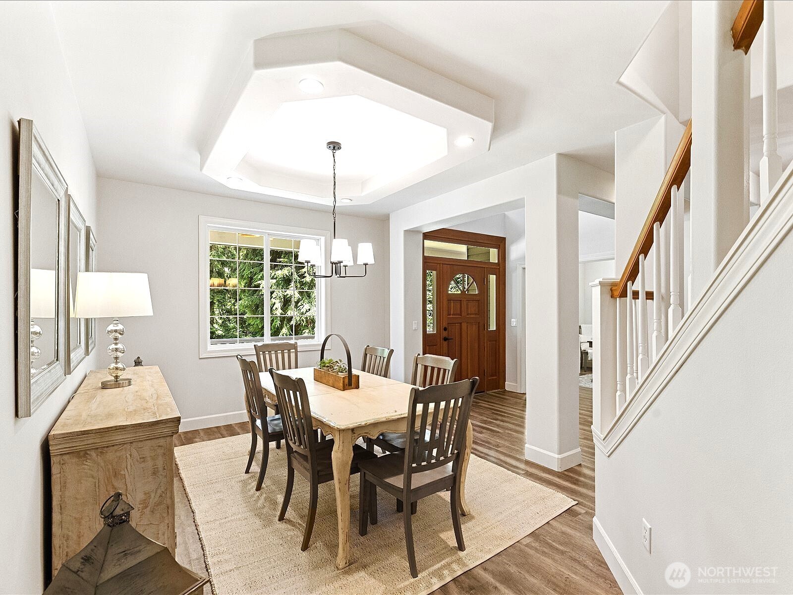 33606 Northeast Lake Joy Road Carnation, WA 98014 - Photo 13 of 40 a view of a dining room with furniture window and wooden floor