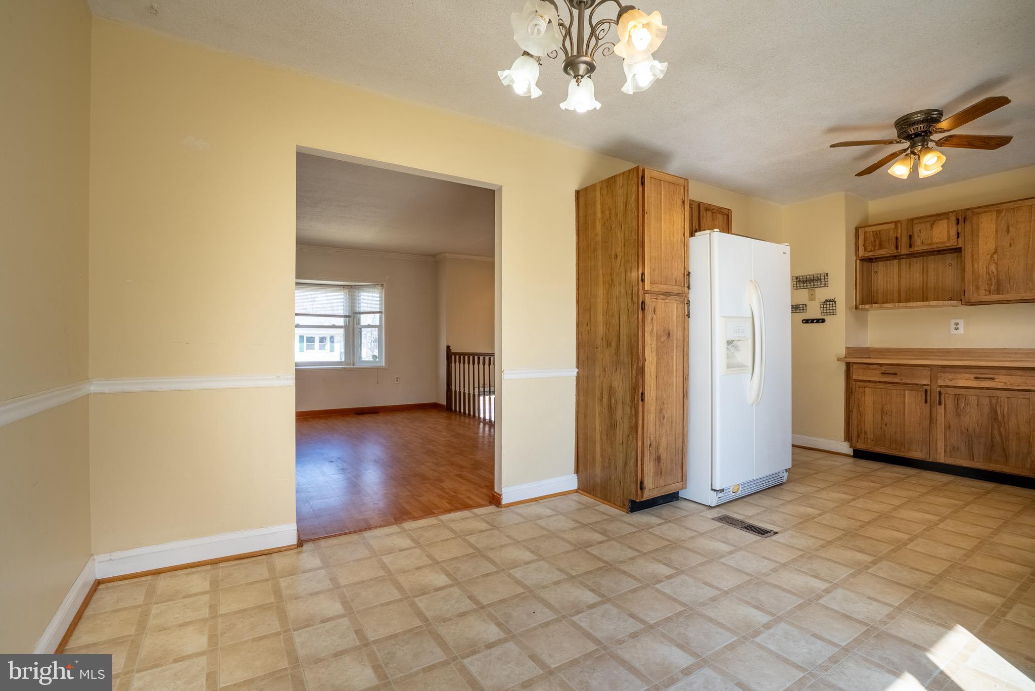 2275 Dairy Farm Road Gambrills, MD 21054 - Photo 12 of 57 a view of a kitchen with a sink and cabinet area