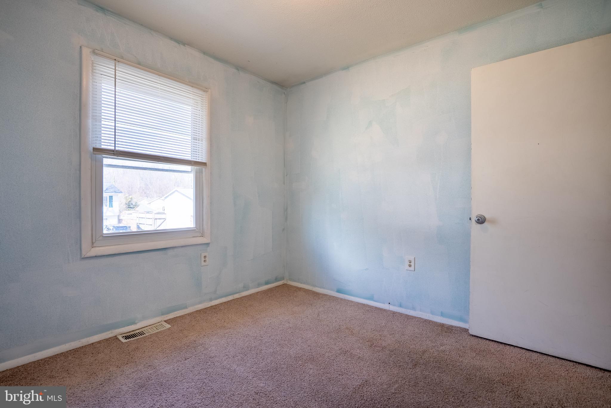 2275 Dairy Farm Road Gambrills, MD 21054 - Photo 14 of 57 an empty room with windows and closet