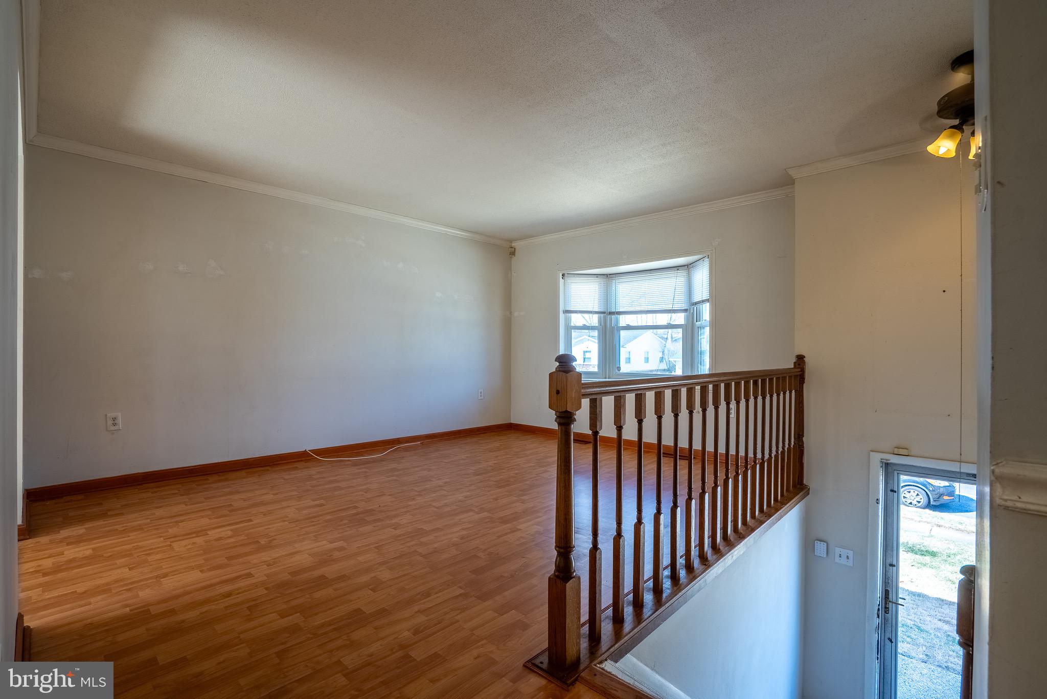2275 Dairy Farm Road Gambrills, MD 21054 - Photo 3 of 57 wooden floor in an empty room with a window