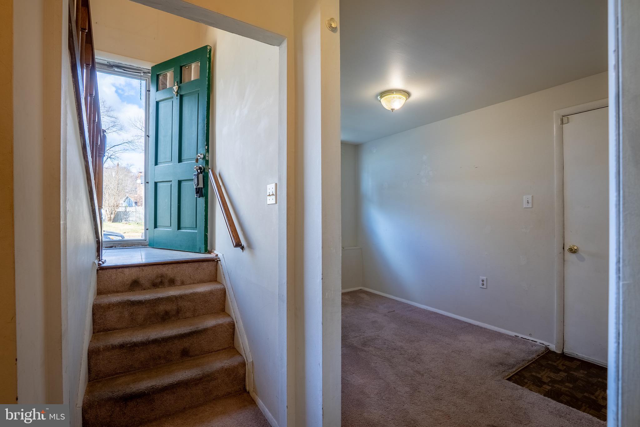2275 Dairy Farm Road Gambrills, MD 21054 - Photo 31 of 57 a view of a hallway with entryway wooden floor and stairs