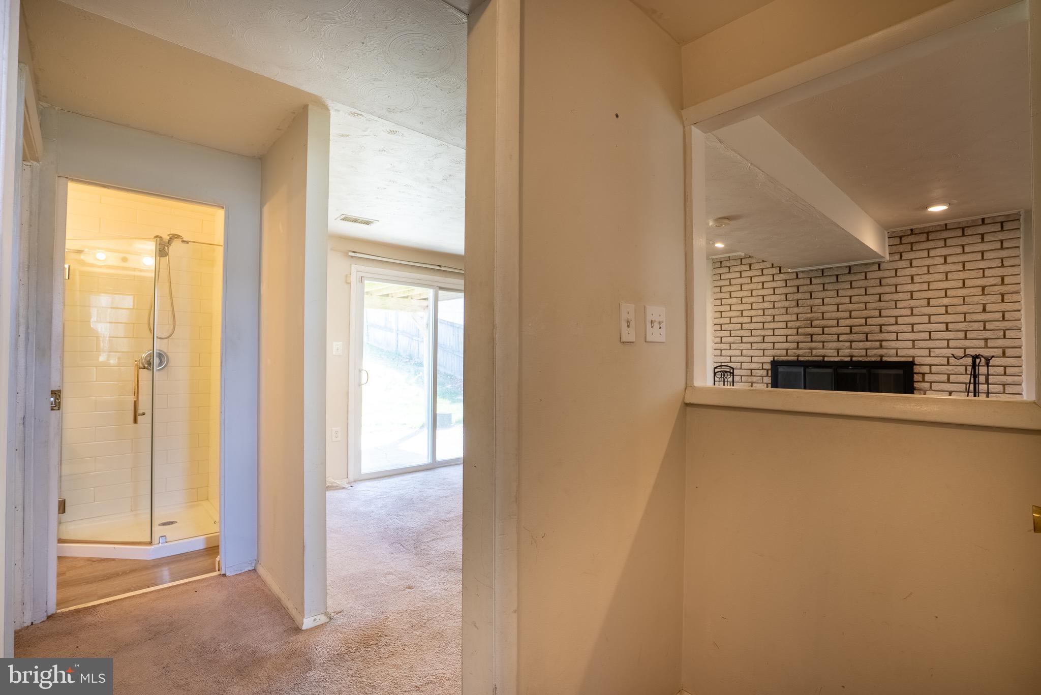 2275 Dairy Farm Road Gambrills, MD 21054 - Photo 37 of 57 a view of a livingroom with a fireplace and a window