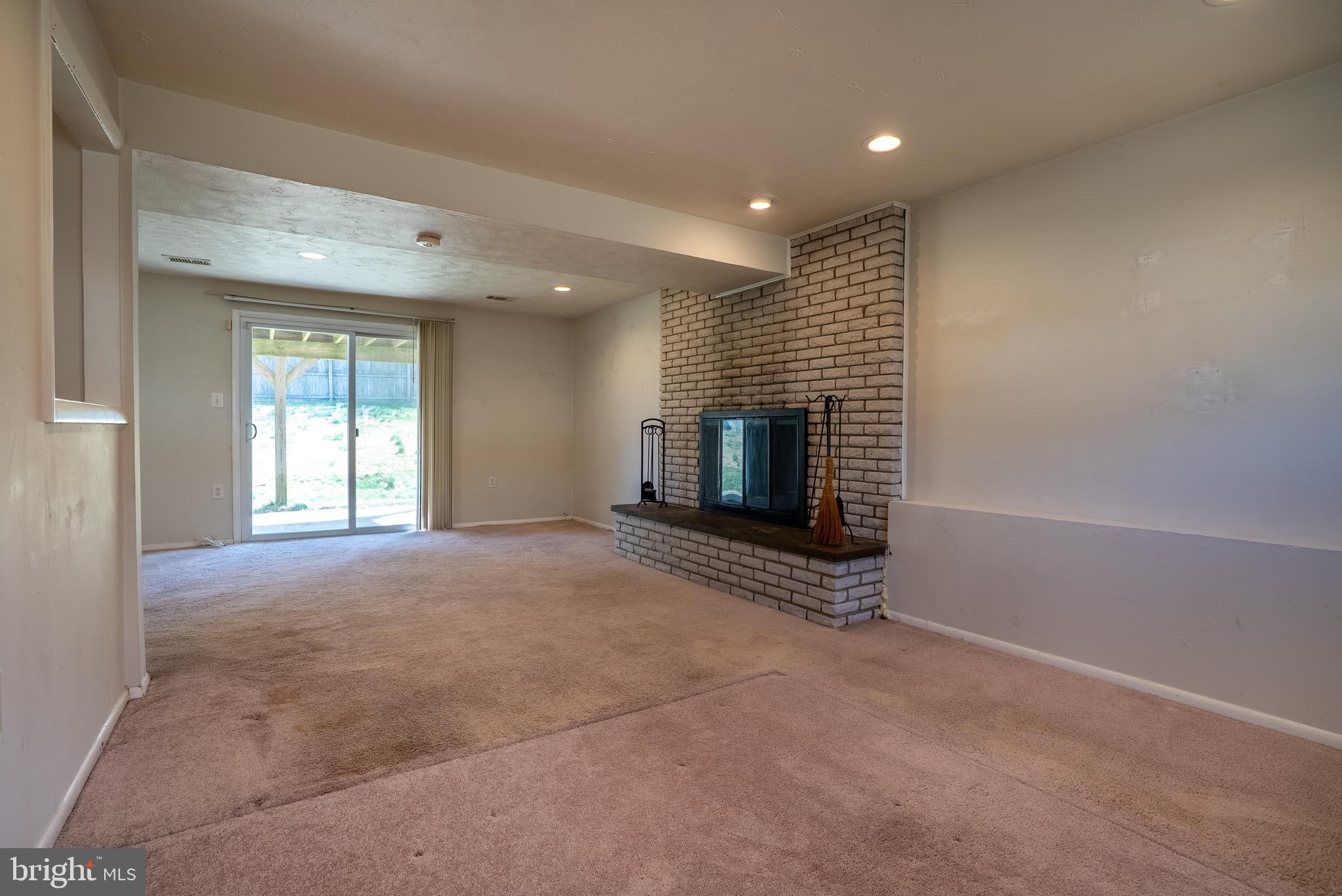 2275 Dairy Farm Road Gambrills, MD 21054 - Photo 40 of 57 a view of an empty room with a window and fireplace