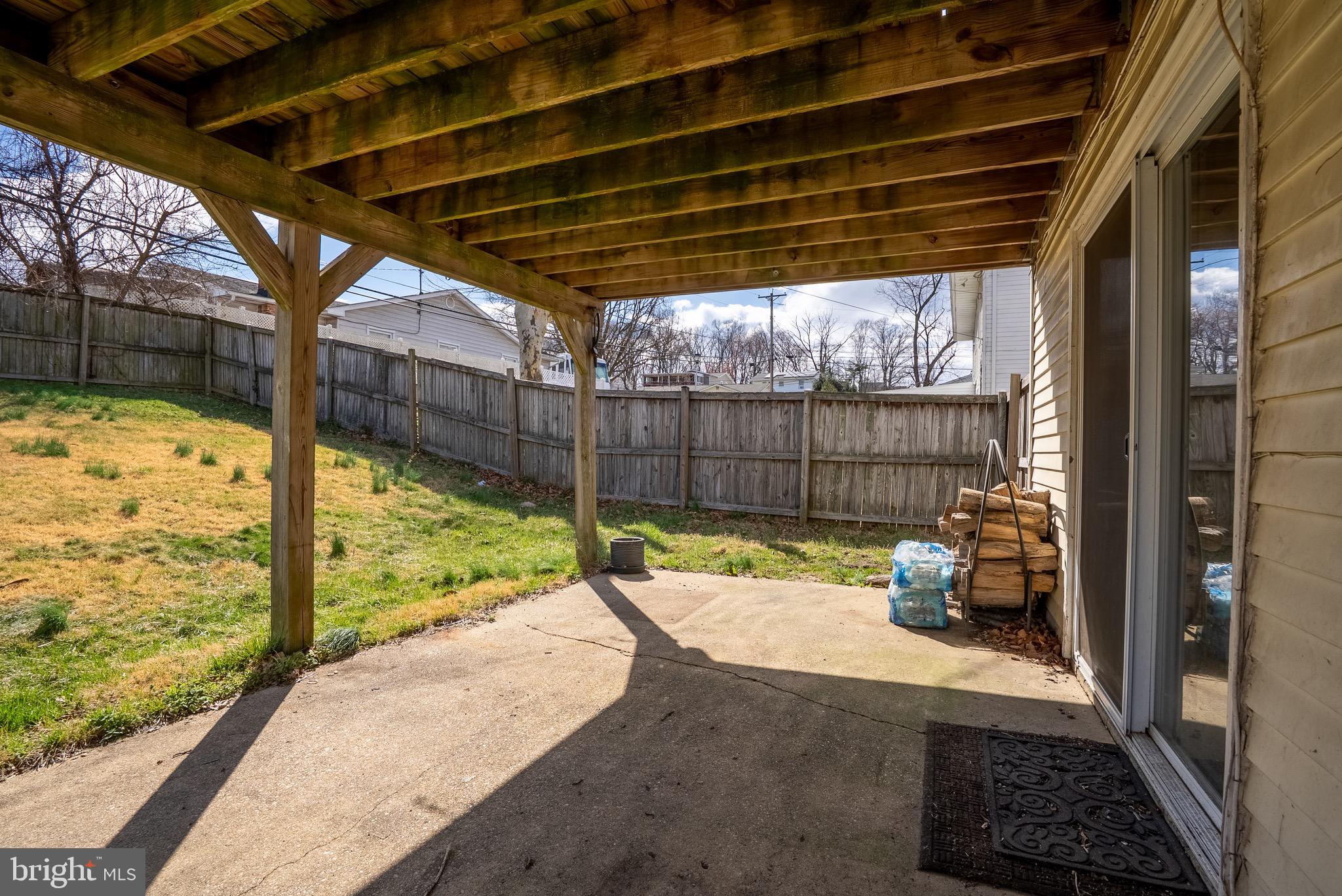2275 Dairy Farm Road Gambrills, MD 21054 - Photo 45 of 57 a view of a backyard with wooden floor and a potted plant
