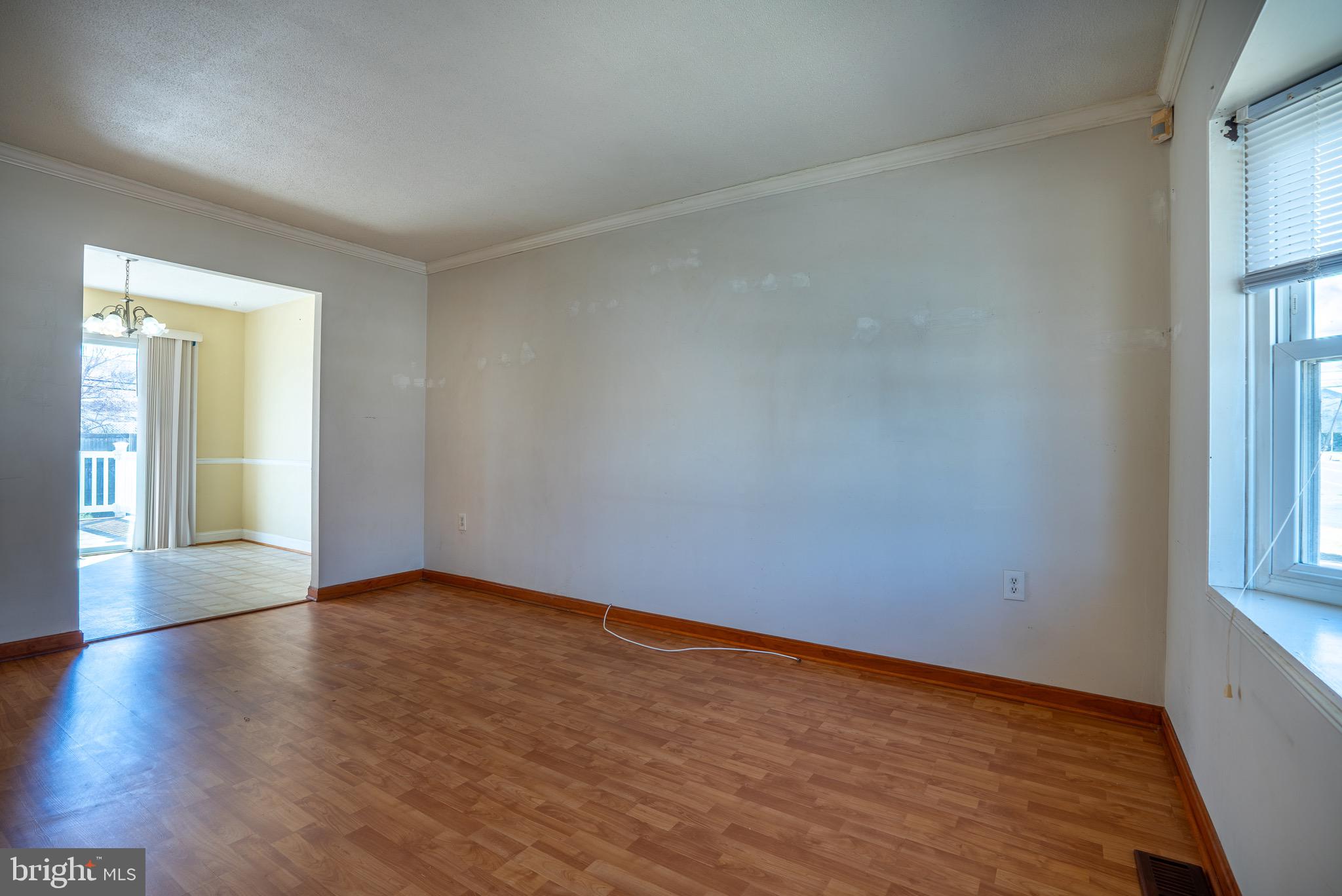 2275 Dairy Farm Road Gambrills, MD 21054 - Photo 5 of 57 wooden floor in an empty room with a window