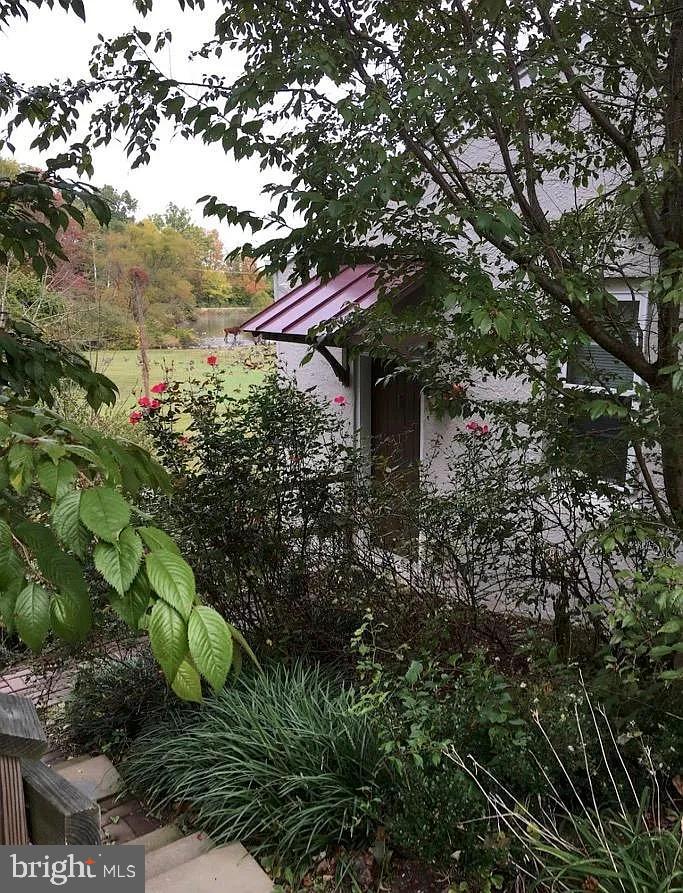 85 Valley Road, Unit 1 Phoenixville, PA 19460 - Photo 4 of 28 a backyard of a house with lots of green space