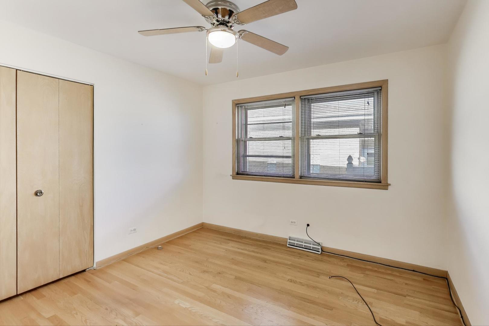 Undisclosed Address Chicago, IL 60656 - Photo 22 of 37 a view of an empty room with a window