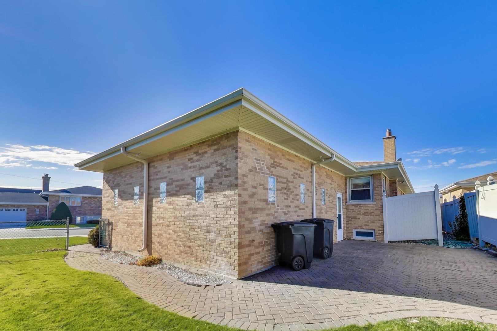 Undisclosed Address Chicago, IL 60656 - Photo 34 of 37 a view of a house with a yard