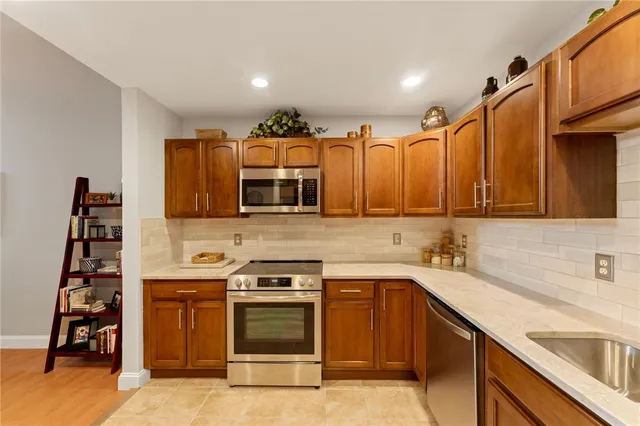 $419,000 | 1 Tupperware Drive, Unit 226, North Smithfield, RI 02896