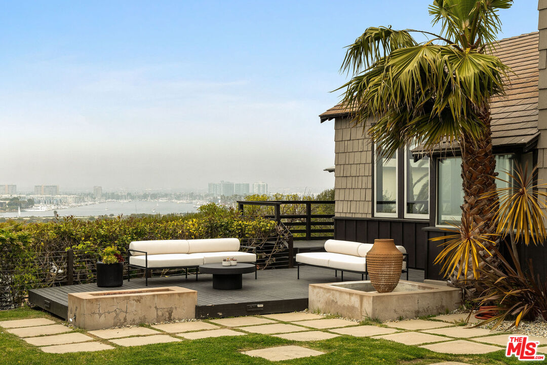 240 Montreal Street Playa del Rey, CA 90293 - Photo 1 of 2 a view of a lake with couches chairs