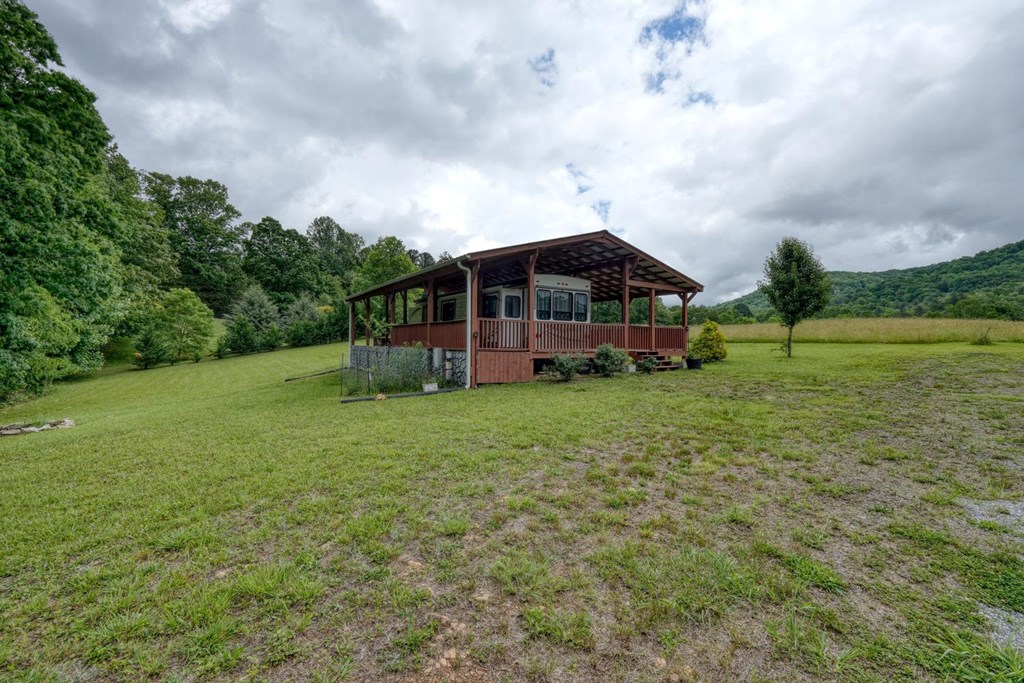568 Parks Road Hiawassee, GA 30546 - Photo 26 of 38 a view of a house with a big yard