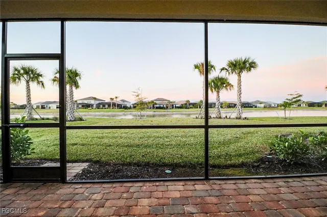 a view of a garden with a lake view