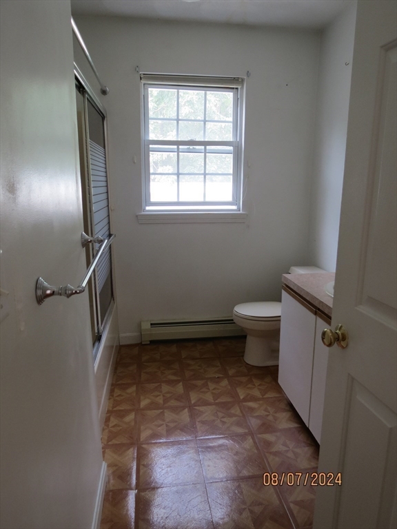 262 Acropolis Road Lowell, MA 01854 - Photo 13 of 31 a bathroom with a toilet