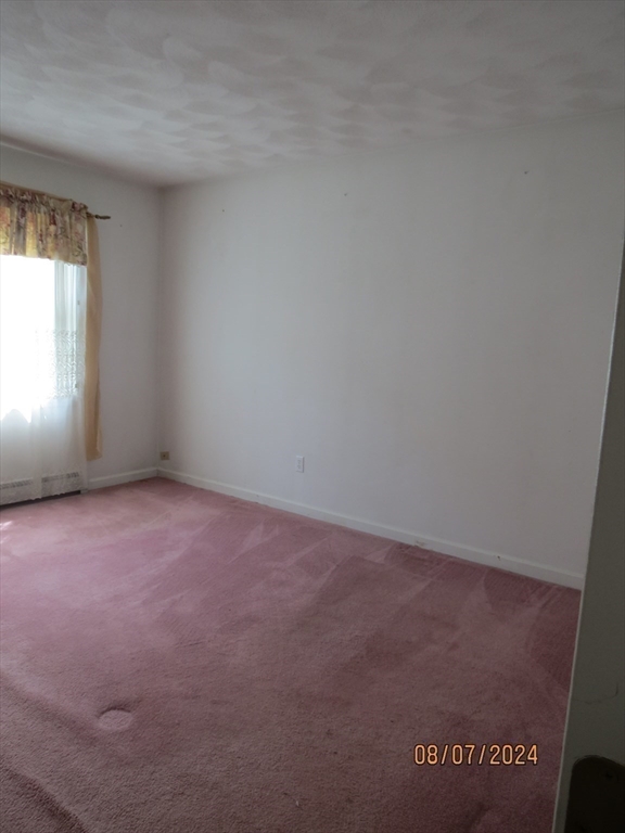 262 Acropolis Road Lowell, MA 01854 - Photo 16 of 31 an empty room with window
